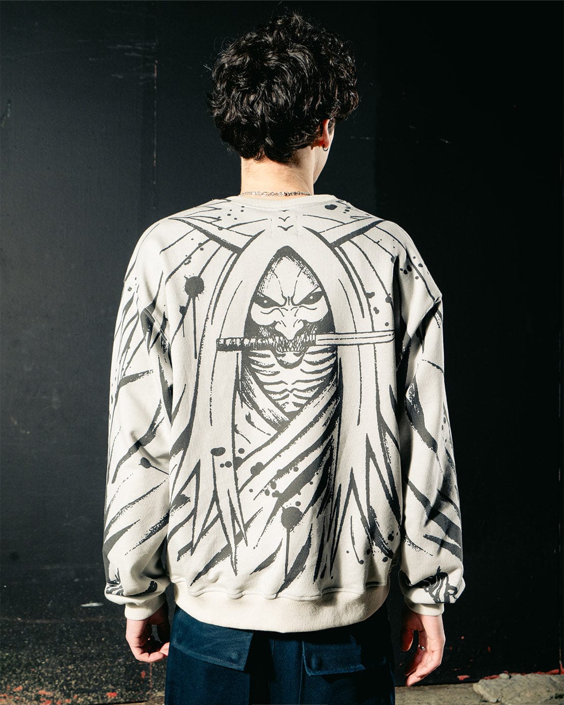 Back on-body view of the Reaper Crewneck in size M.
