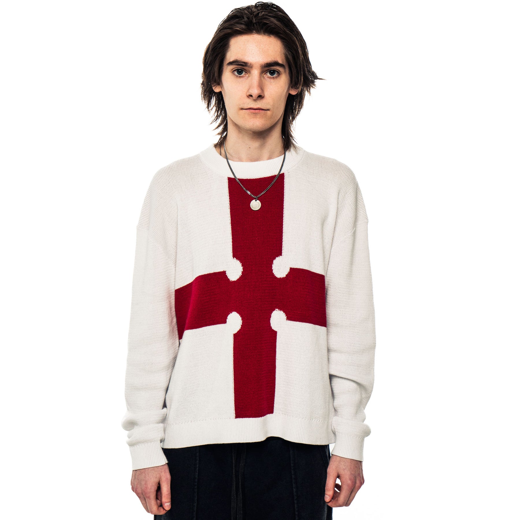 Model wearing the Evangelist Sweater in size M.